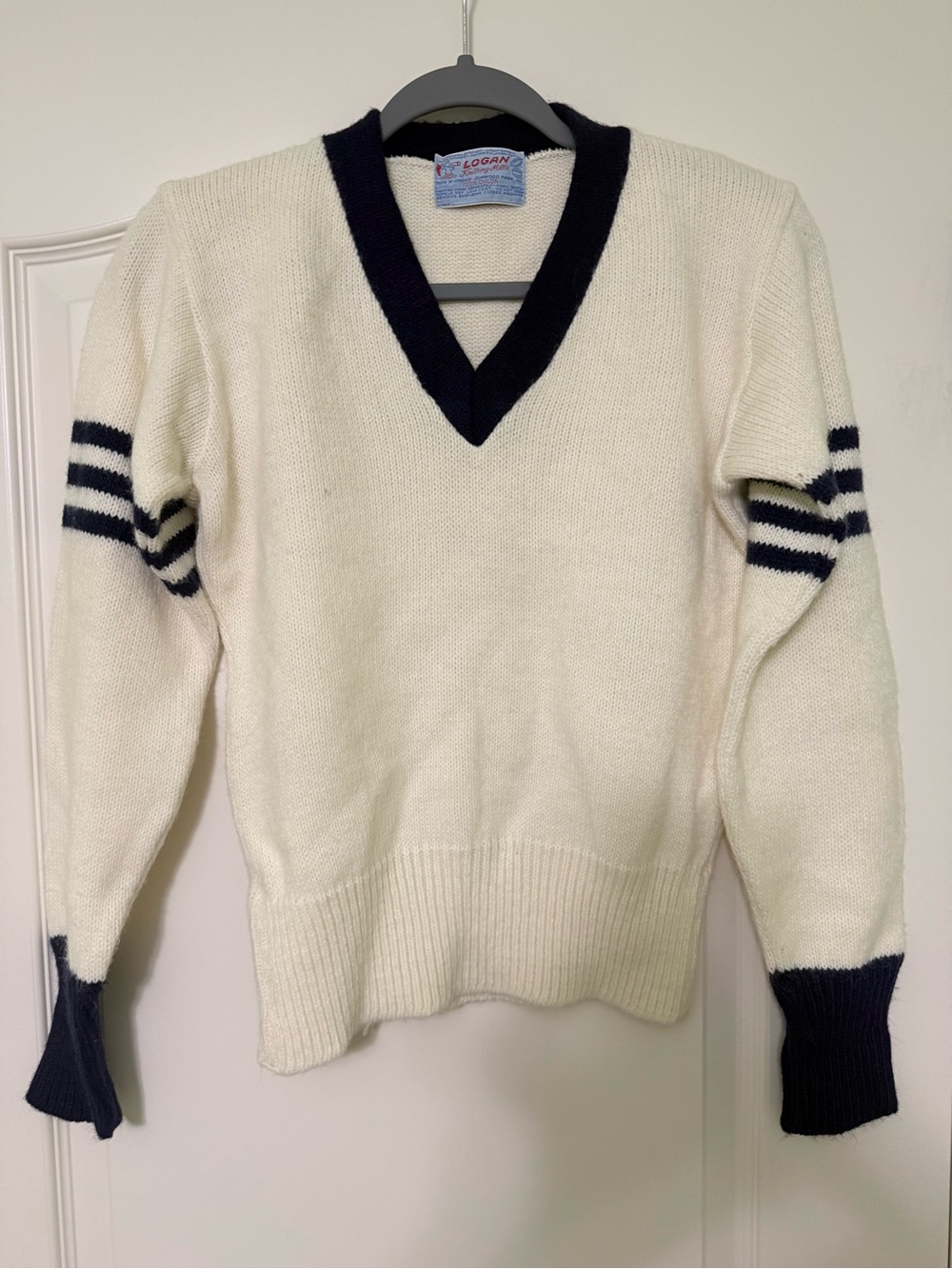 Vintage Cream V-Neck Cheerleading Sweater with Navy Trim